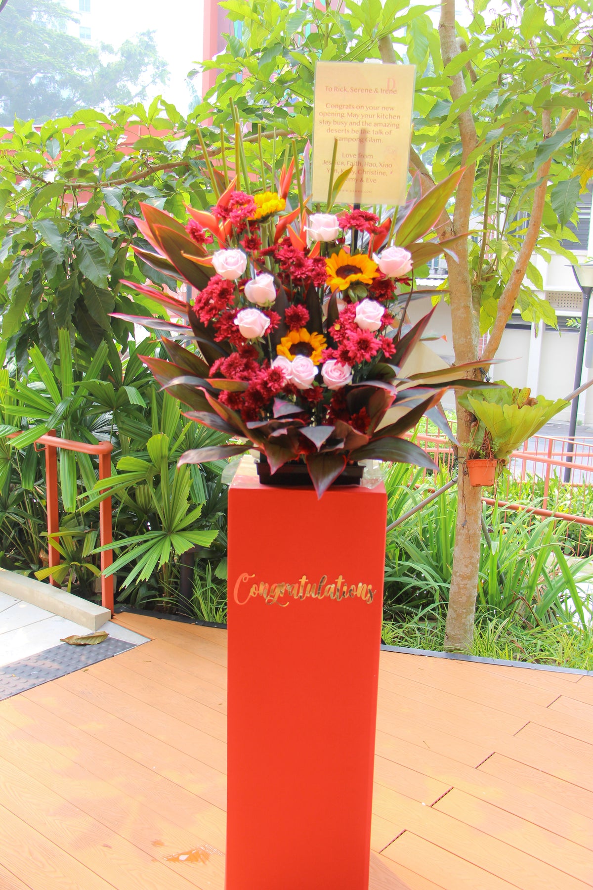 Crimson Sunrise – Grand Opening Flower Stand