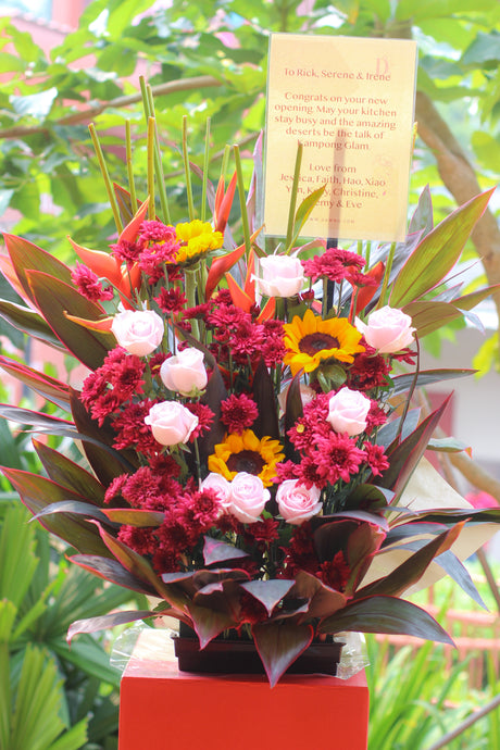 Crimson Sunrise – Grand Opening Flower Stand