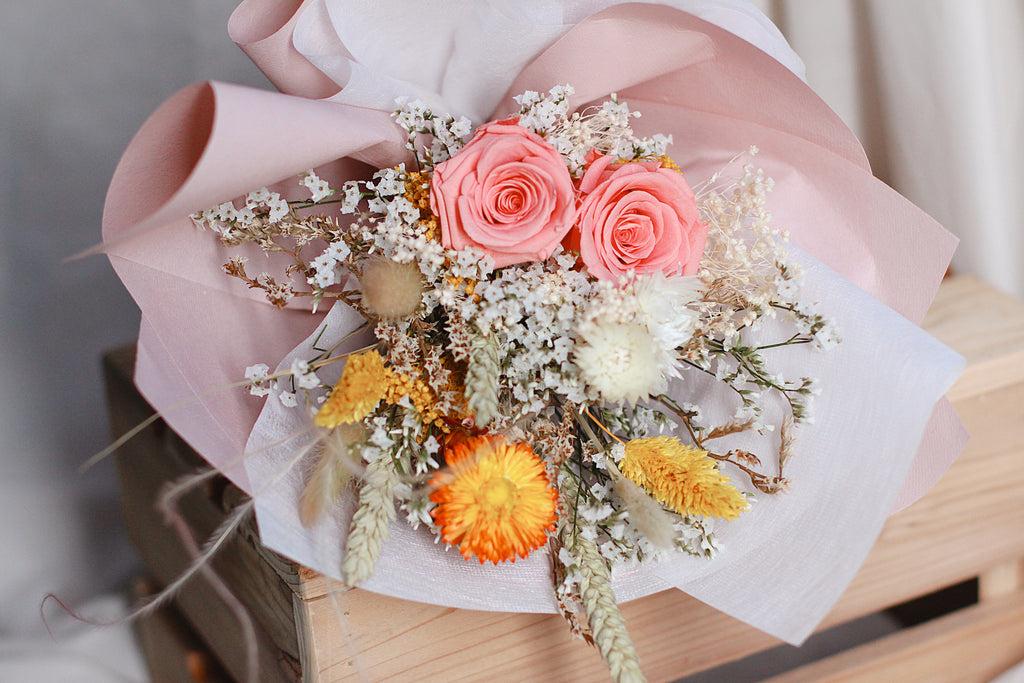dried pink yellow roses bouquet